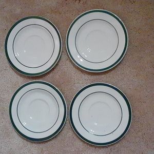 4 small plates, green and white, like new. No damage